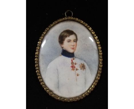 Portrait miniature on ivory of a young gentleman - royalty? in a gilt brass oval frame with a laurel leaf pattern -height 3½"
