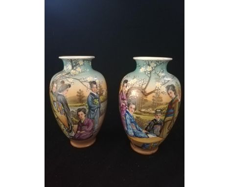 Pair Japanese vases with scenes in transfer print