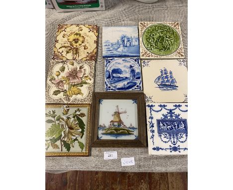 A selection of nine assorted antique ceramic tiles including Delft 