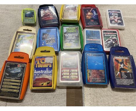 A box full of assorted Top Trumps playing cards 