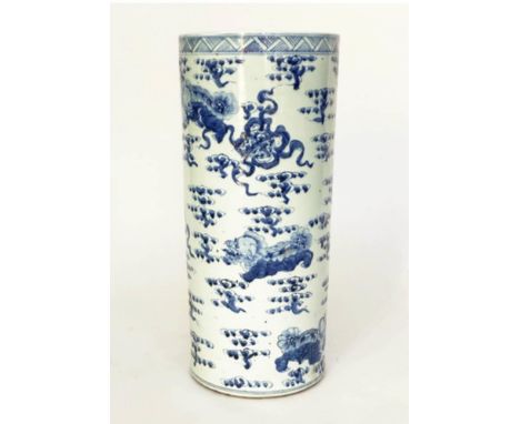 STICK STAND, Chinese blue and white ceramic of cylindrical form with dragon and cloud decoration, 61cm H x 27cm. 