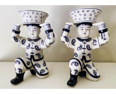 KNEELING SOLDIER TRINKET DISHES, a pair, 33cm x 23cm x 18cm, Chinese export style blue and white ceramic. (2) 