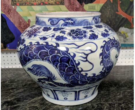 CHINESE JAR, Yuan Dynasty style, blue and white decorated with a dragon chasing the flaming pearl of wisdom, 30cm H x 35cm W.