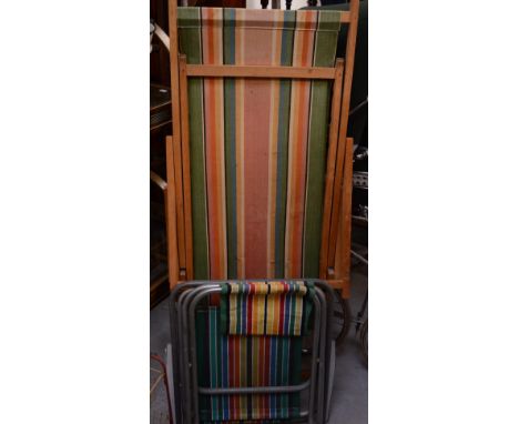 A beech folding deckchair, a metal 1950s folding deckchair and fishing stool, an enamel ware basin and silver swallow enamel 