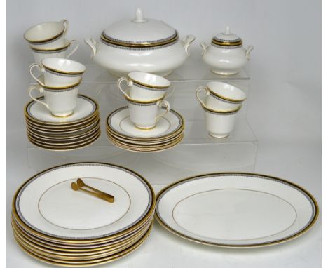 A Royal Doulton 'Pavanne' part dinner and tea service comprising eleven dinner plates, a meat plate, eight cups and saucers, 