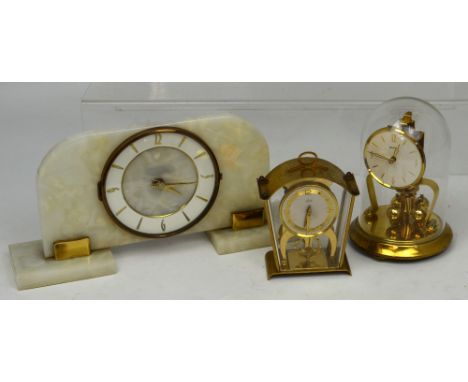 Three mantel clocks to include a reproduction Art Deco style clock, a Schatz clock and a Bentima alarm clock (3).