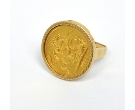 An Elizabeth II full sovereign 1963 mounted in a 9ct yellow gold ring, size U, approx 14.9g.