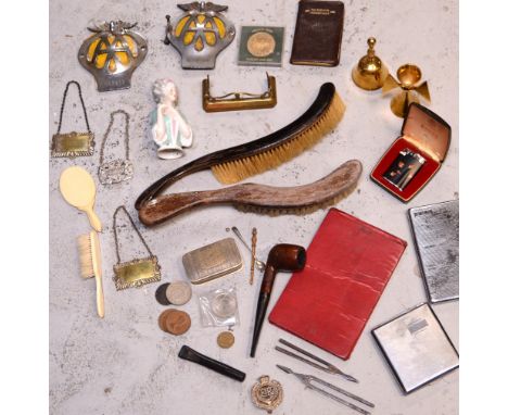 A collectors' lot to include vintage AA membership badges, brushes, brassware, decanter labels etc.