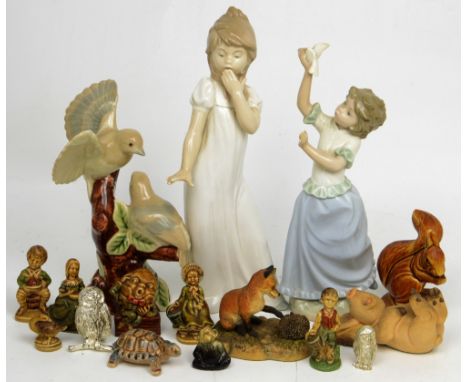 A group of figures to include Wade nursery rhyme figures; Humpty Dumpty, Jack & Jill, Tom Thumb etc, a Poole squirrel figure,