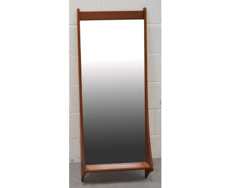 A 1950s-1960s Danish teak Pedersen and Hansen rectangular mirror with shelf, length 111cm.