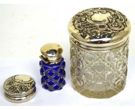 An Edward VII hallmarked silver topped hobnail-cut glass large trinket pot, Birmingham 1905, a blue glass overlaid perfume bo