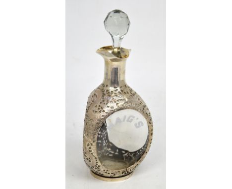 A 20th century Chinese silver-mounted 'Haig's' dimple decanter, the pierced design featuring dragons amongst clouds, height a