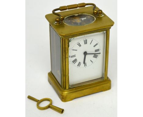 A late 18th-early 19th R & Co French brass carriage clock, white enamel rectangular dial set with Roman numerals, stamped 'R 