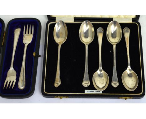 A George V cased set of five hallmarked silver teaspoons with Art Nouveau finial (lacking one teaspoon), Birmingham 1940 and 