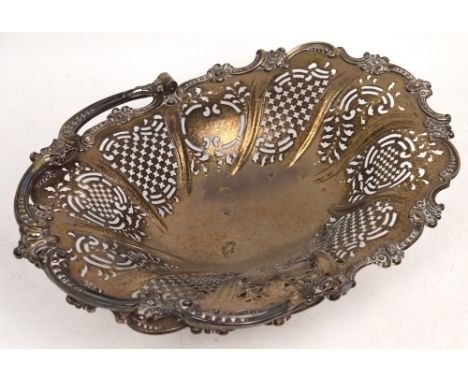 A Victorian hallmarked silver pierced oval basket with swing handle, Henry Wilkinson & Co, London 1858, approx 19.5ozt.