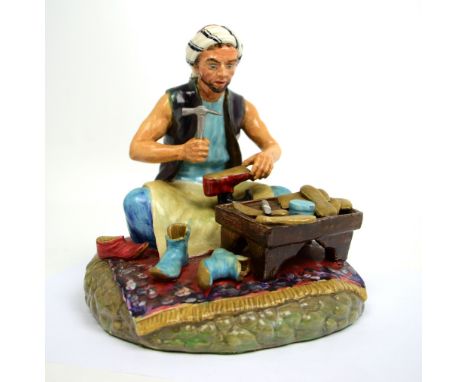 A Reg Johnson figure 'Cobbler of Baghdad', height approx 20cm.   CONDITION REPORT  The knife and hammer have been glued to th