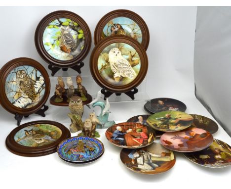 A large quantity of collectors' plates and resin owls to include Coalport 'The Wise Owl' collectors' plates, Royal Worcester 