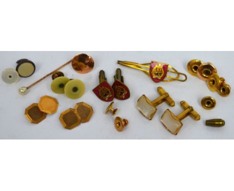 A pair of 9ct yellow gold cufflinks, seven 9ct gold collar studs, one 15ct gold collar stud, a pair of yellow metal cufflinks