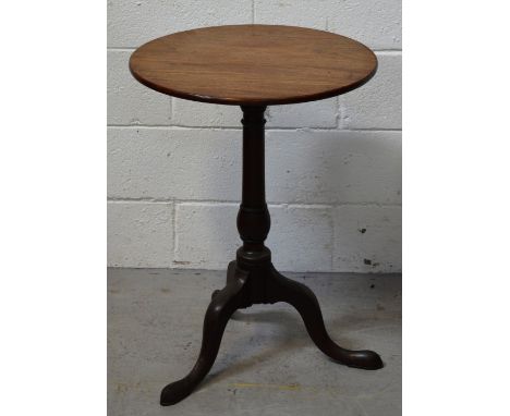 A 19th century mahogany circular lamp table raised on tripod supports, diameter 51cm, height 70cm.