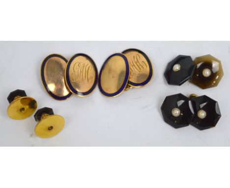 A cased set of 9ct yellow gold cufflinks with blue enamel edge and a pair of 9ct yellow gold onyx and seed pearl cufflinks an