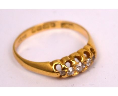 An 18ct gold ladies' dress ring set with five graduating diamonds, size K 1/2, approx 2.2g.