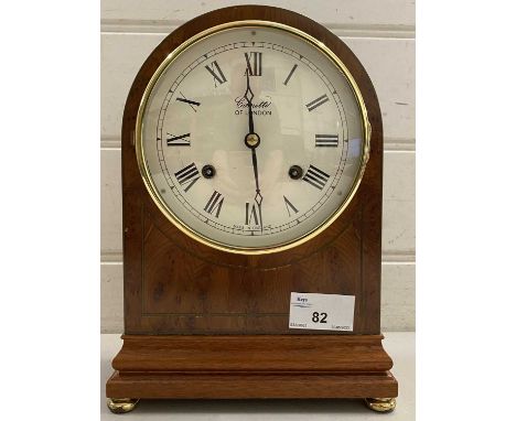 Comitti of London mantel clock in domed brass inlaid case