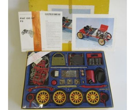 A Pocher 1:8 scale model kit of a Fiat 130 HP Grand Prix race car, some foxing to box and corner repairs, kit contents are st