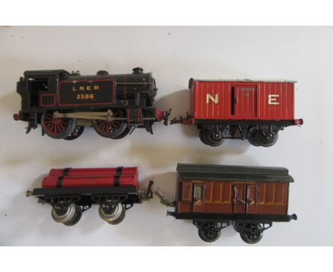 Hornby clockwork No1 Special 0-4-0 Tank Locomotive L.N.E.R. 2586, some paint loss, an N.E. Gun Powder van, Gas Cylinder and G