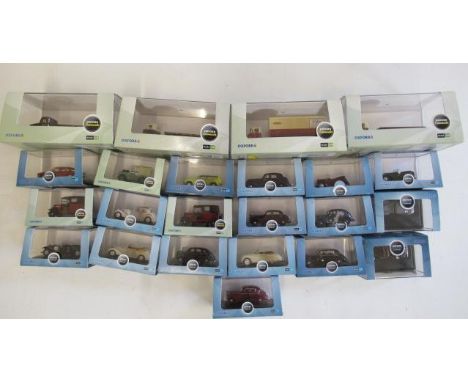 Twenty three Oxford diecast 1:76 scale vehicles including cars, railway delivery wagons and classic vehicles, all items boxed