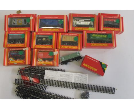 Eleven Hornby Goods Trucks including Brake Van, Rail Stores Van, Lion Works Wagon, Tarmac Hopper and Red Line Tank Wagon, tog