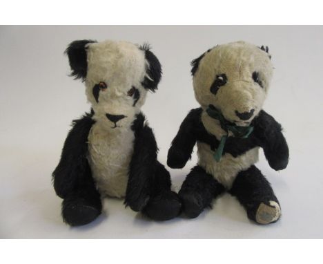 A Chad Valley panda, with glass eyes, jointed limbs and label to foot, 13" high, together with a similar panda (2) (Est. plus