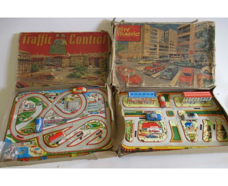 Two Technic clockwork car and track sets comprising "Traffic Control" with two cars, one bus and road signs, box AF, track an