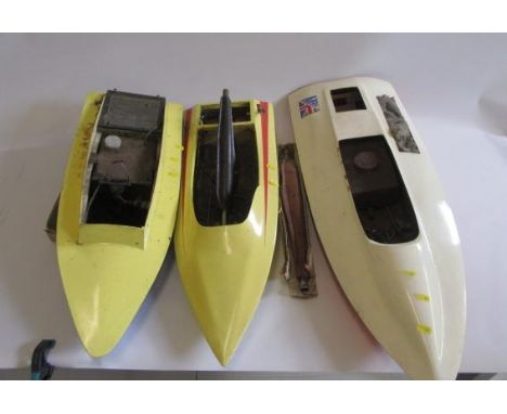 Three model racing boat hulls, wood and fibre glass construction, with two engine exhaust pipes, F (Est. plus 21% premium inc