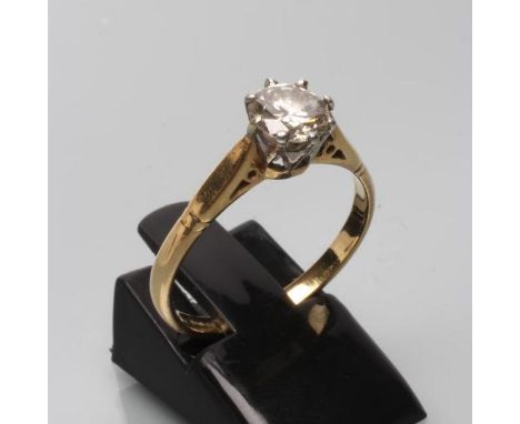 A SOLITAIRE DIAMOND RING, the round brilliant cut stone of approximately 0.90cts, claw set to a plain 18ct gold shank, Birmin