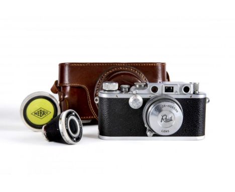 A REID & SIGRIST "REID" CAMERA, with Taylor-Hobson Anastigmat two inch f/2 lens No.328296, leather case, Braun Universal-Such