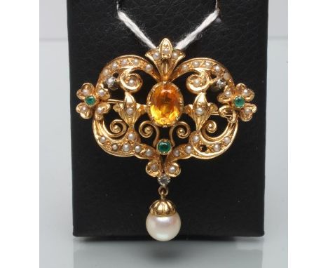 A MULTI-GEM SET 18CT GOLD RENAISSANCE STYLE BROOCH/PENDANT of open cartouche form, the central claw set topaz within seed pea