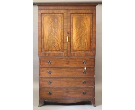 A REGENCY MAHOGANY AND EBONY STRUNG SECRETAIRE LINEN PRESS, the cavetto cornice over a pair of banded and cut corner veneered