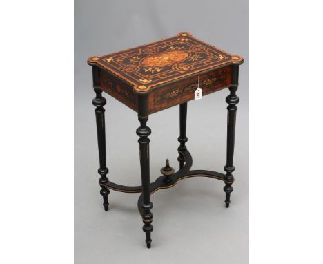 A VICTORIAN EBONISED AND YEW WOOD BANDED WORK TABLE of oblong form protruding corners and gilt metal mounts, the hinged top i