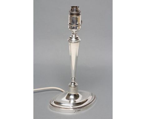 A SILVER ELECTRIC TABLE LAMP BASE, maker Elkington Ltd., Sheffield 1925, as a plain navette candlestick, 10" high excluding f
