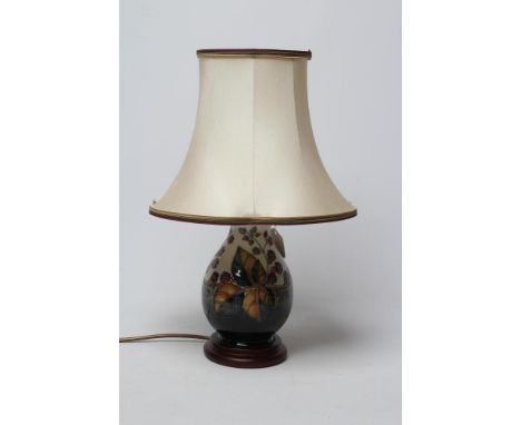 A MOORCROFT POTTERY BRAMBLE PATTERN ELECTRIC TABLE LAMP BASE, modern, of inverted baluster form, tubelined and painted in col