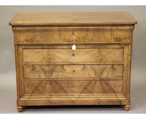 A FRENCH BLEACHED WALNUT COMMODE, late 19th century, of rounded oblong form with reeded edged quarter veneered top, deep ogee