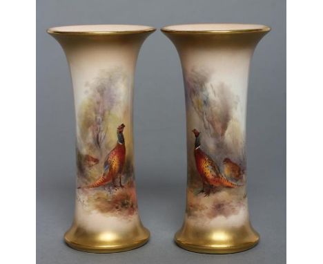 A PAIR OF ROYAL WORCESTER CHINA SMALL VASES, 1928, of waisted cylindrical form, painted in colours by James Stinton with pair