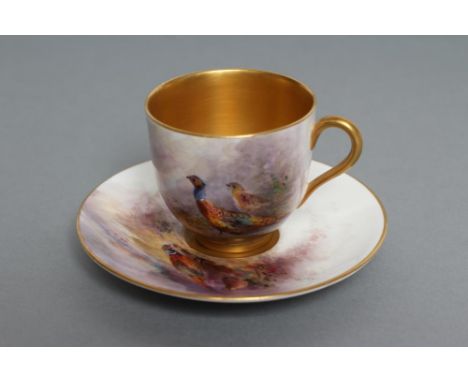 A ROYAL WORCESTER CHINA CABINET CUP AND SAUCER, 1923 and 1929, the cup exterior and saucer border painted in colours by Jas. 