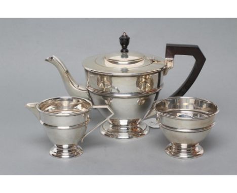 AN ART DECO SILVER THREE PIECE TEA SERVICE, maker Barker Bros. Ld., Birmingham 1929, of single girdled rounded conical form, 