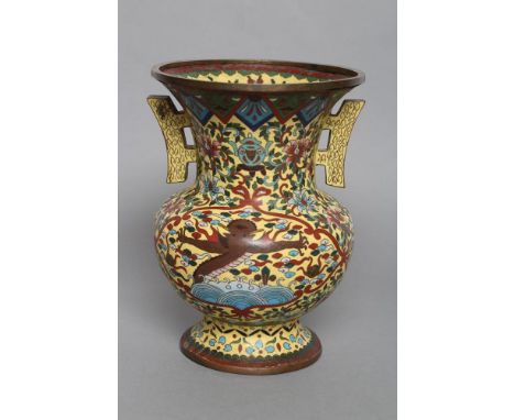 A CHINESE CHAMPLEVE ENAMEL VASE of baluster form with two angular handles, decorated in colours with precious objects within 