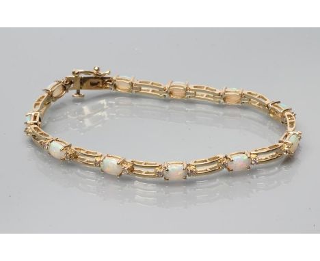 AN OPAL AND DIAMOND BRACELET, the oval polished cabochon opals claw set to plain open arched links and flanked by a small dia