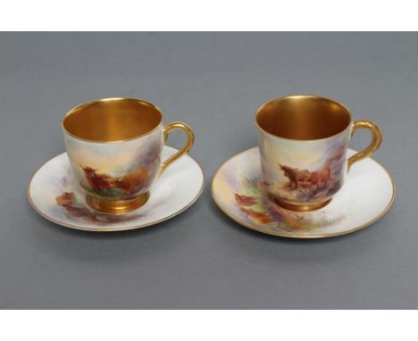 A ROYAL WORCESTER CHINA CABINET CUP AND SAUCER, 1935, the cup exterior and saucer border painted by Stinton with Highland cat