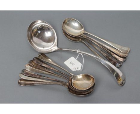 A SET OF TWELVE SILVER RAT-TAIL PATTERN SOUP SPOONS, maker Frank Cobb, Sheffield 1927, together with a matching soup ladle, 4