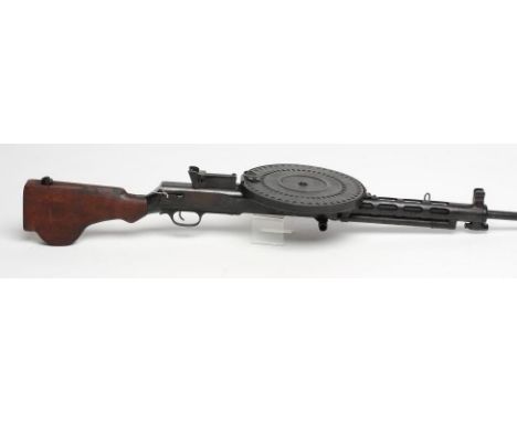 A DEACTIVATED RUSSIAN DP28 7.62MM LIGHT MACHINE GUN, with removable drum magazine, moving bolt, adjustable ramp rear sight an