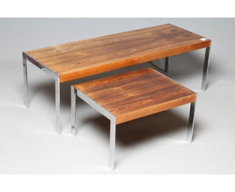 A MERROW ASSOCIATES ROSEWOOD AND CHROME COFFEE TABLE, 1960/70's, of oblong form with square section chrome end supports, 48 1